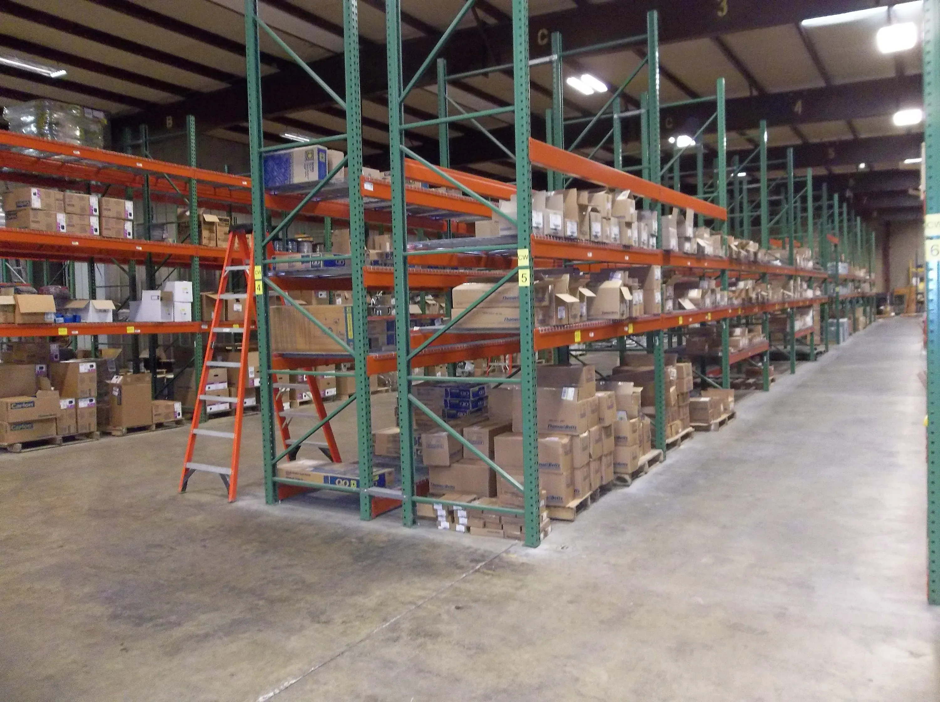 Boxed electrical supplies on warehouse shelving in Jackson