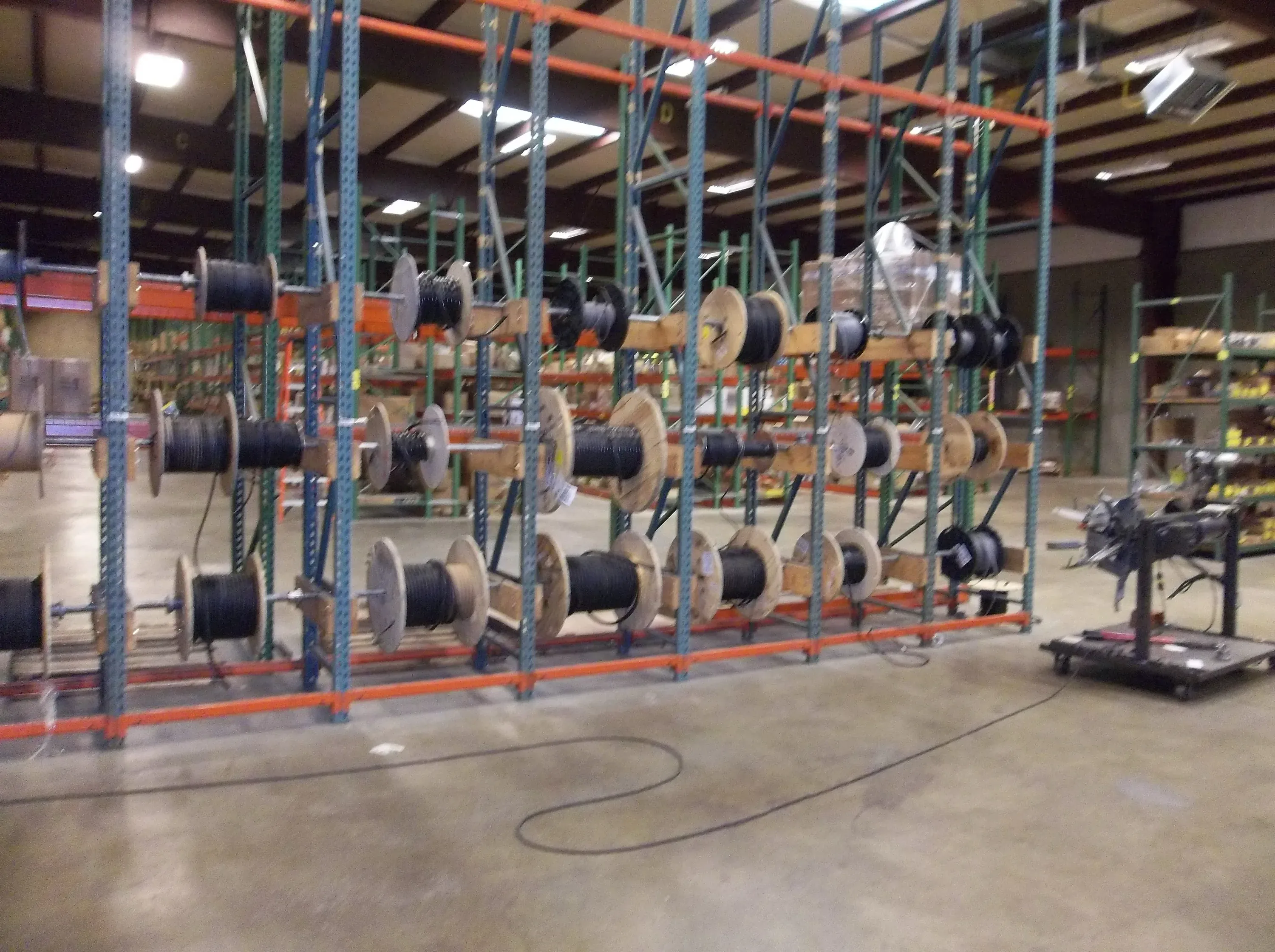 Reels of electrical cable on shelving in the Jackson warehouse
